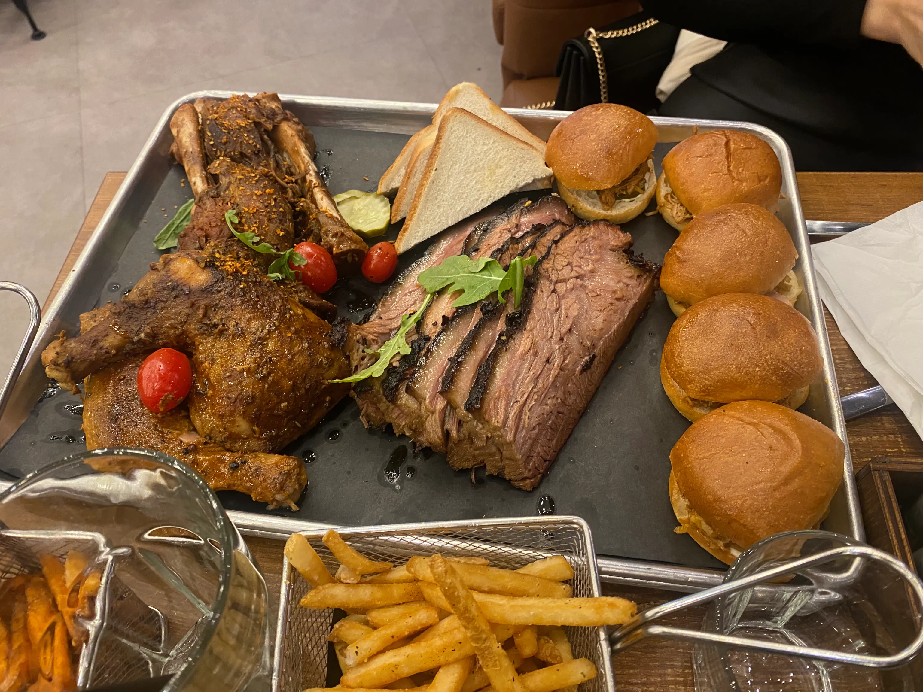 Signature smoked BBQ platter with brisket and ribs at Backyard Smokehouse Toronto